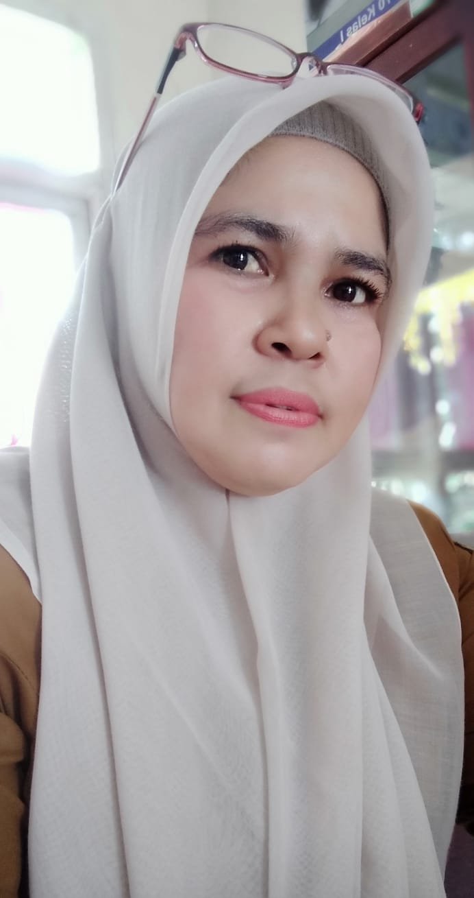 <center>Guru PAI<br>Fatimah Zohra,S.Ag</center>